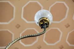 A decorative lamp fixture in the nave