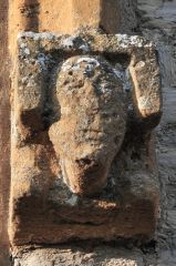 Carved head, south nave wall