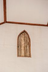 Mysterious door high on the west wall