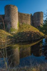 The castle reflected in the moat