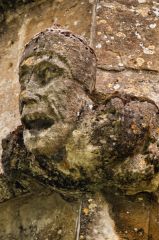 Grotesque carved head