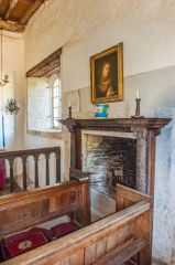 A fireplace inside the chapel
