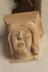 Medieval corbel head of a woman