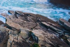 Rock formations by the shore
