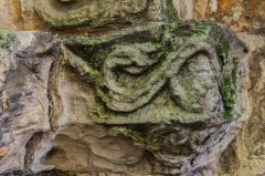 Serpent carving on the doorway capital