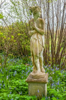 A neo-classical statue in the gardens