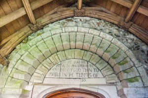 The Norman doorway and 17th century inscription