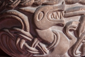 Carved dragon on the font bowl