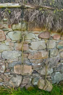Thatching on Old Leanach Cottage