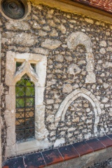 Norman stonework, chancel wall