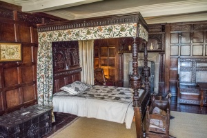 A richly carved 17th century four-poster bed