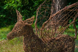 Amusing wicker sculptures dot the garden