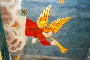 A trumpeting angel figure