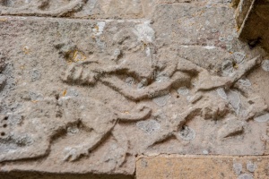 Carving of a huntsman