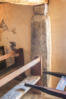 Standing stone in the south wall