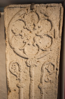13th century floriated slab of an abbot
