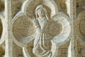 Carved figure on the 15th century font