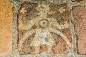 Medieval tile of a demon