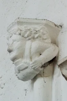 Amusing medieval corbel head