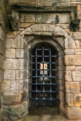 A barred gate at the castle entrance