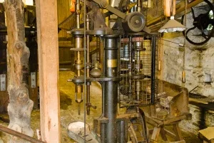 Press used for cutting 'cakes' to size