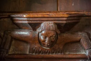 Head of a man misericord