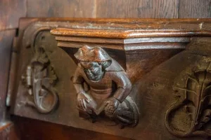 A woman with hands on her knees