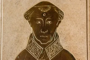 14th century brass of a priest