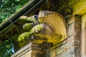 A fanciful flying turtle carving on the north wall