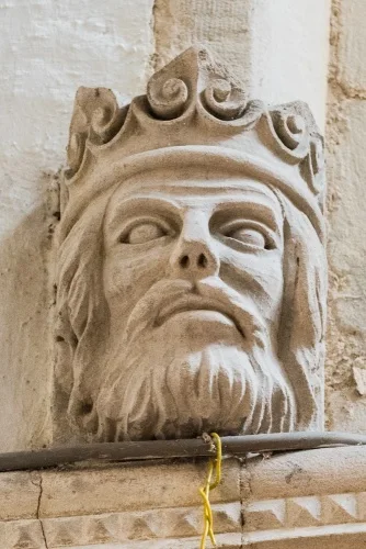 Head of Edward I, chancel arch