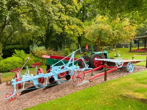 Farm machinery in the grounds