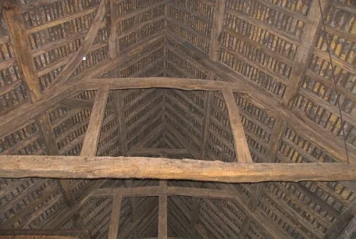 The timber-framed barn interior