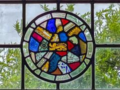 Stained-glass roundel in the nave