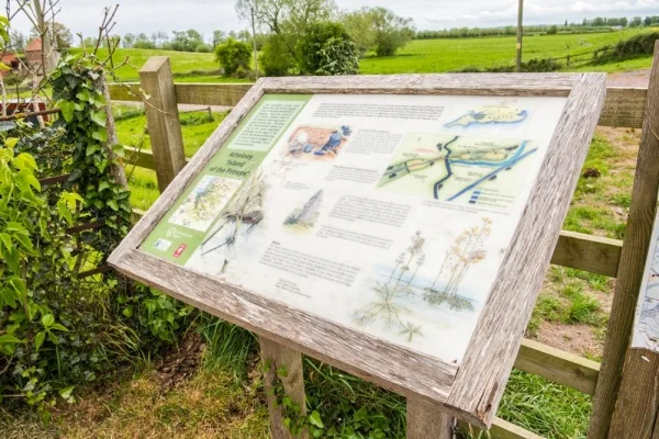 Information panel with the Abbey site in the background