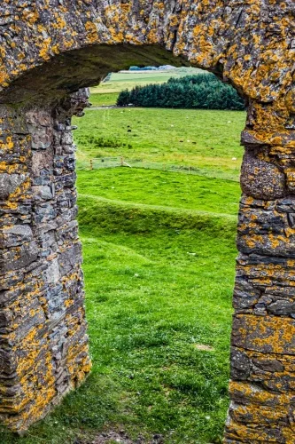 Earthworks through an outer doorway arch