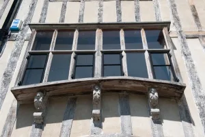 Projecting mullioned window, first floor