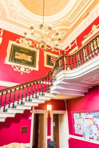 The entrance hall and cantilevered staircase