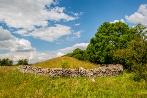 Belas Knap from outside the surrounding stone wall