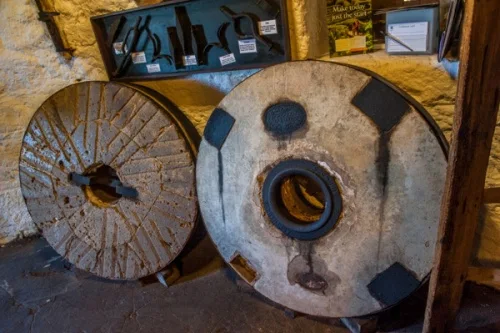 A pair of used grinding stones