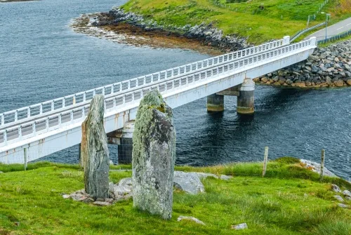 The standing stones look down on Bernera Bridge