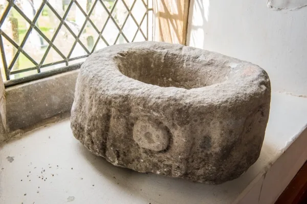 The medieval 'swine's trough' font bowl