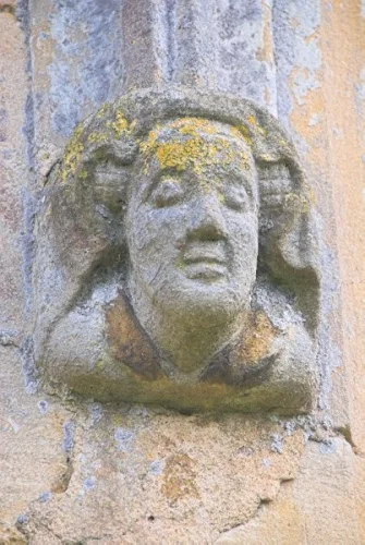Carved head of a woman