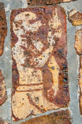 Medieval tile of a human figure