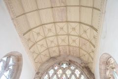 The barrel-vaulted chancel ceiling