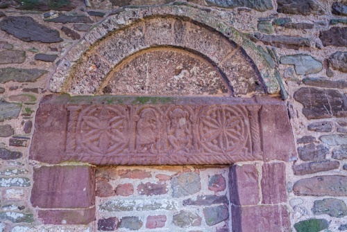 Bird and monkey carvings, north door