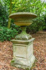 Neoclassical urn in the woodlands