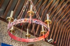 Metal candelabra in the nave