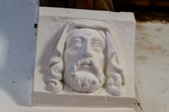 Carved corbel head