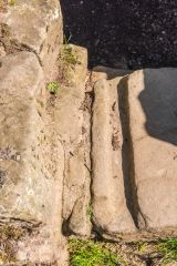 Doorway grooves in the threshold stone