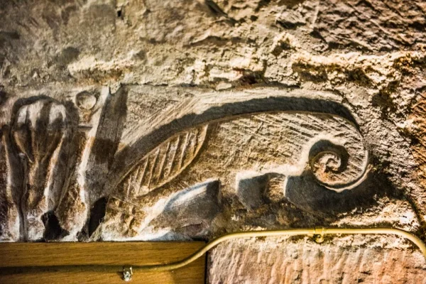 Norman tympanum over the tower door